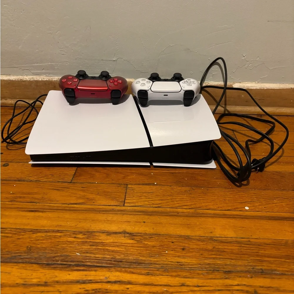Sony Console with White and Red Controllers